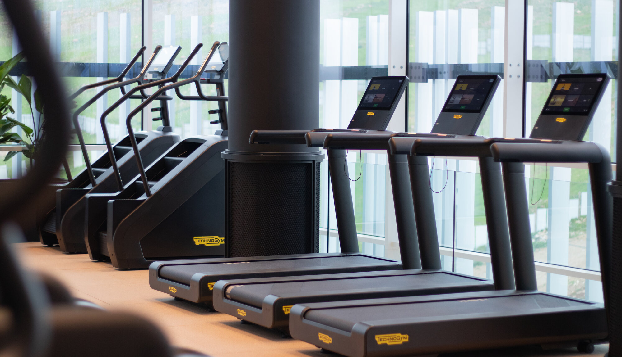 The cardio floor at Vy Boutique, overlooking the hills